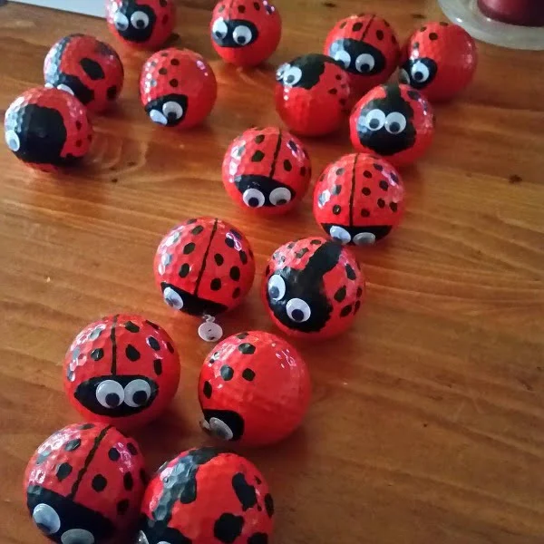 Make lady bug from used golf balls