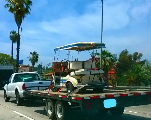 Step-by-Step Guide to Loading a Golf Cart into a Truck Bed.