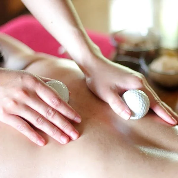 Use old golf balls as a Massage Tool